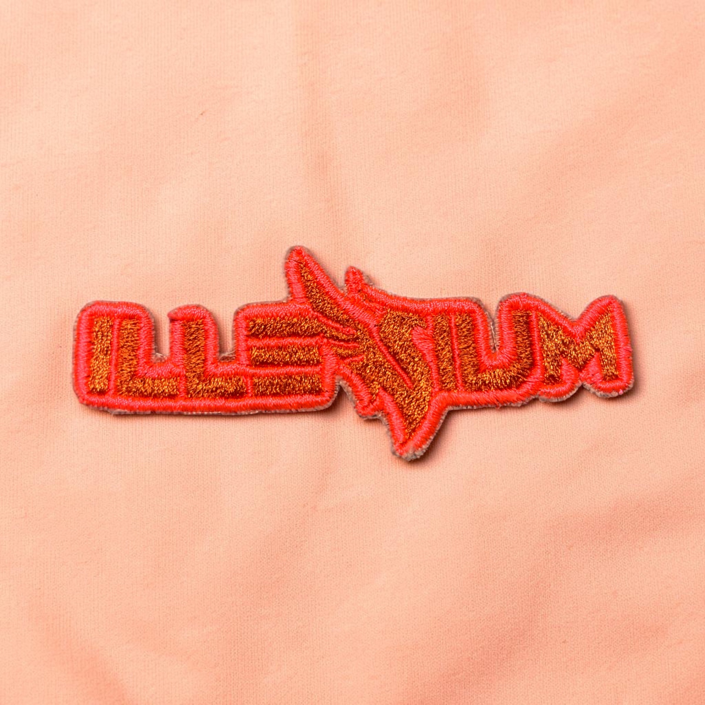 Orange Illenium Iron On Patch